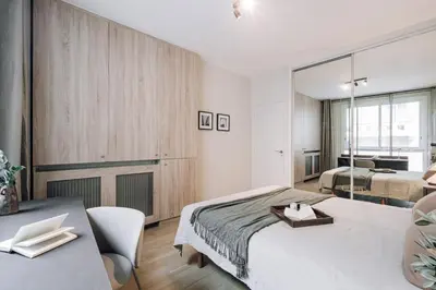 Un ou plusieurs lits dans un hébergement de l'établissement Moda - 3 chambres à Trocadéro