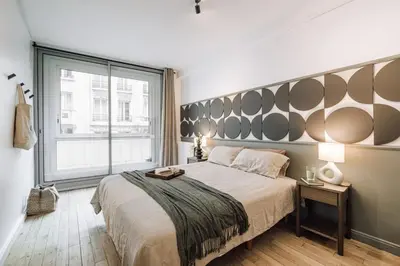 Un ou plusieurs lits dans un hébergement de l'établissement Moda - 3 chambres à Trocadéro