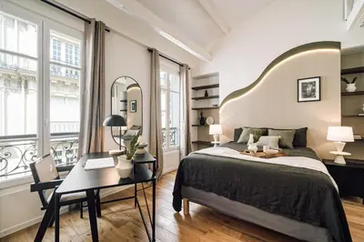 Un ou plusieurs lits dans un hébergement de l'établissement Amatique - 2 chambres à Saint-Germain-Des-Prés