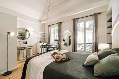 Un ou plusieurs lits dans un hébergement de l'établissement Amatique - 2 chambres à Saint-Germain-Des-Prés