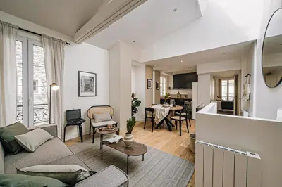 Coin salon dans l'établissement Amatique - 2 chambres à Saint-Germain-Des-Prés