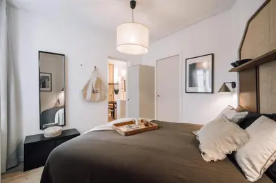 Un ou plusieurs lits dans un hébergement de l'établissement Louis - 1 chambre à Bastille
