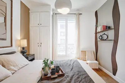 Un ou plusieurs lits dans un hébergement de l'établissement Pales - 1 chambre à Vaugirard
