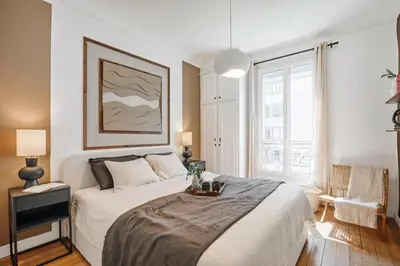 Un ou plusieurs lits dans un hébergement de l'établissement Pales - 1 chambre à Vaugirard