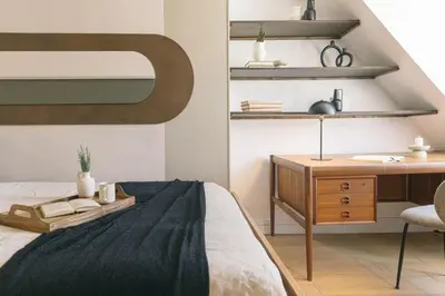 Un ou plusieurs lits dans un hébergement de l'établissement Ukayil - 3 chambres à Louvre (1Arr.)