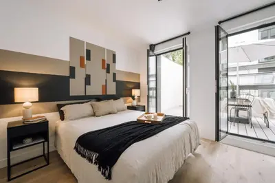 Un ou plusieurs lits dans un hébergement de l'établissement Bastille - 1 chambre et terrasse à Pere-Lachaise