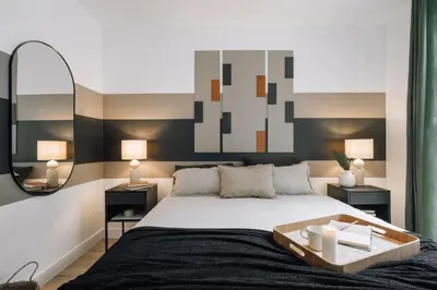 Un ou plusieurs lits dans un hébergement de l'établissement Bastille - 1 chambre et terrasse à Pere-Lachaise