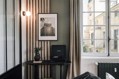 Télévision ou salle de divertissement dans l'établissement Katun - 1 chambre à Trocadéro