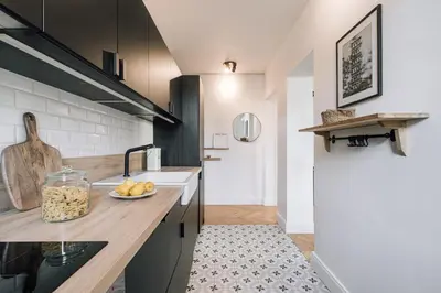 Cuisine ou kitchenette dans l'établissement Katun - 1 chambre à Trocadéro
