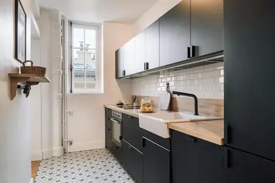 Cuisine ou kitchenette dans l'établissement Katun - 1 chambre à Trocadéro