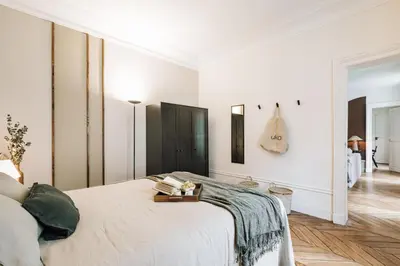 Un ou plusieurs lits dans un hébergement de l'établissement Saray - 1 chambre à Invalides