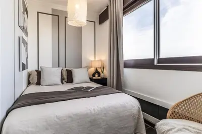 Un ou plusieurs lits dans un hébergement de l'établissement Auvers - 1 chambre à Javel