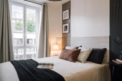 Un ou plusieurs lits dans un hébergement de l'établissement Mimi - 1 chambre à La Motte-Picquet-Grenelle