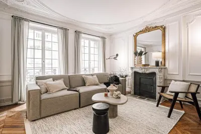 Coin salon dans l'établissement Lazare - 3 chambres à Ternes
