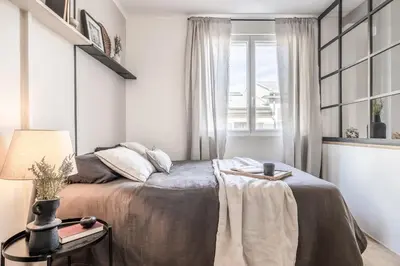 Un ou plusieurs lits dans un hébergement de l'établissement Amandiers - studio à Père-Lachaise
