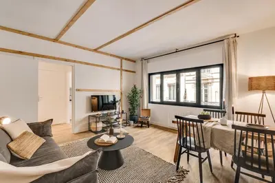 Coin salon dans l'établissement Vall - 1 chambre à Opéra