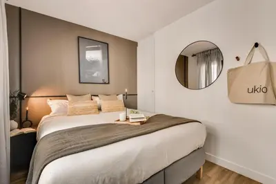Un ou plusieurs lits dans un hébergement de l'établissement Vall - 1 chambre à Opéra