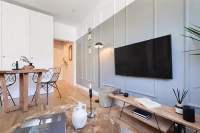 Télévision ou salle de divertissement dans l'établissement Porto - 1 chambre à Auteuil
