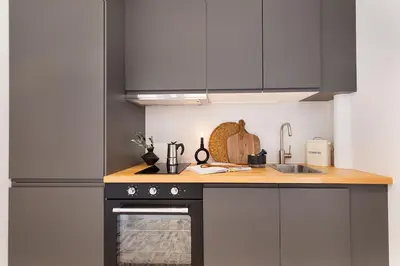 Cuisine ou kitchenette dans l'établissement Porto - 1 chambre à Auteuil