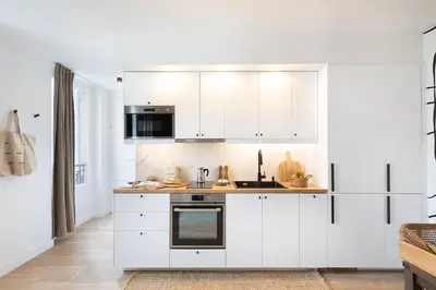 Cuisine ou kitchenette dans l'établissement Erill - Studio à Montparnasse