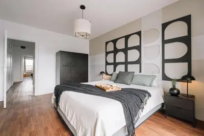 Un ou plusieurs lits dans un hébergement de l'établissement Neel - 3 chambres et balcon à Neuilly-Sur-Seine