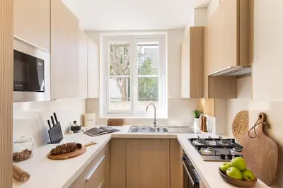 Cuisine ou kitchenette dans l'établissement Taillon - 2 chambres à Trocadéro