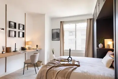 Un ou plusieurs lits dans un hébergement de l'établissement Artix - 1 chambre à Invalides