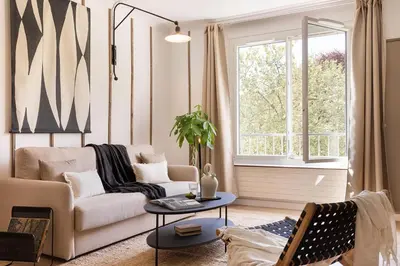 Coin salon dans l'établissement Artix - 1 chambre à Invalides