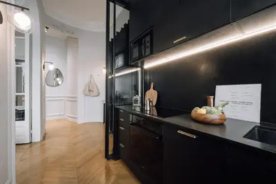 Cuisine ou kitchenette dans l'établissement Stirling - 2 chambres à Porte Dauphine