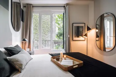 Un ou plusieurs lits dans un hébergement de l'établissement Matisse - 1 chambre à La Muette