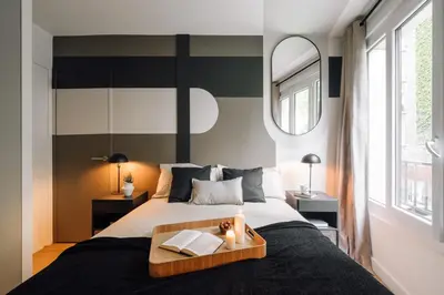 Un ou plusieurs lits dans un hébergement de l'établissement Matisse - 1 chambre à La Muette
