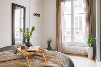 Un ou plusieurs lits dans un hébergement de l'établissement Aya - 1 chambre à Invalides