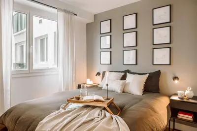 Un ou plusieurs lits dans un hébergement de l'établissement Marcos - 2 chambres et balcon à Batignolles