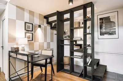 Coin salon dans l'établissement Kenzo - 3 chambres et terrasse à Montmartre