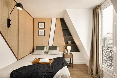 Un ou plusieurs lits dans un hébergement de l'établissement Camiri - 1 chambre à Champs-Élysées (8 Arr.)