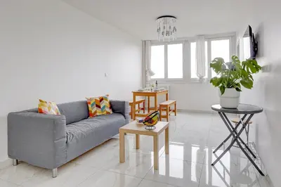 Coin salon dans l'établissement Suite Massena - Opulence au cœur de Paris