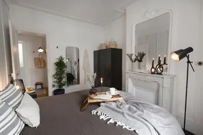 Un ou plusieurs lits dans un hébergement de l'établissement Arlaud - 2 chambres et balcon à Jardin des Plantes