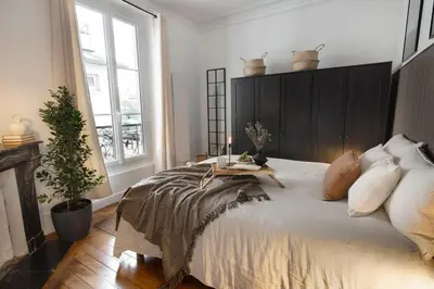 Un ou plusieurs lits dans un hébergement de l'établissement Arlaud - 2 chambres et balcon à Jardin des Plantes