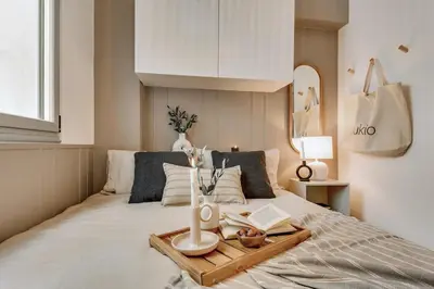 Un ou plusieurs lits dans un hébergement de l'établissement Andrea - 1 chambre et terrace à Champs de Mars
