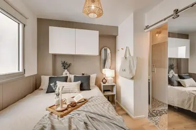 Un ou plusieurs lits dans un hébergement de l'établissement Andrea - 1 chambre et terrace à Champs de Mars