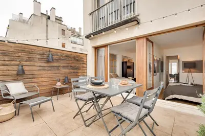 Coin salon dans l'établissement Orhy - 2 chambres et terrasse à Porte Dauphine