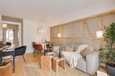 Coin salon dans l'établissement Orhy - 2 chambres et terrasse à Porte Dauphine