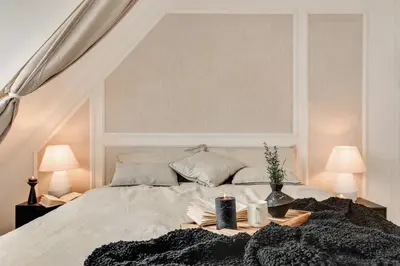 Un ou plusieurs lits dans un hébergement de l'établissement Castro - 1 chambre à Champs de Mars
