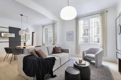 Coin salon dans l'établissement Grenelle - 2 chambres à Saint-Lambert