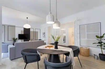 Coin salon dans l'établissement Grenelle - 2 chambres à Saint-Lambert