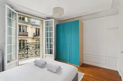 Un ou plusieurs lits dans un hébergement de l'établissement Haussmannian and Central - Montmartre and Sacré-Coeur