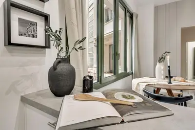 Coin salon dans l'établissement Dauphine - 1 chambre à Auteuil