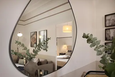 Un ou plusieurs lits dans un hébergement de l'établissement Ternes - 1 chambre à Ternes