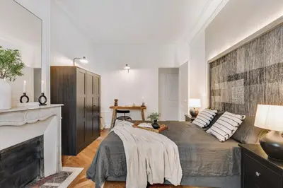 Un ou plusieurs lits dans un hébergement de l'établissement Seine - 3 chambres à Hôtel de Ville