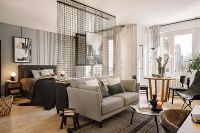 Coin salon dans l'établissement Nuria - Studio et balcon à Auteuil